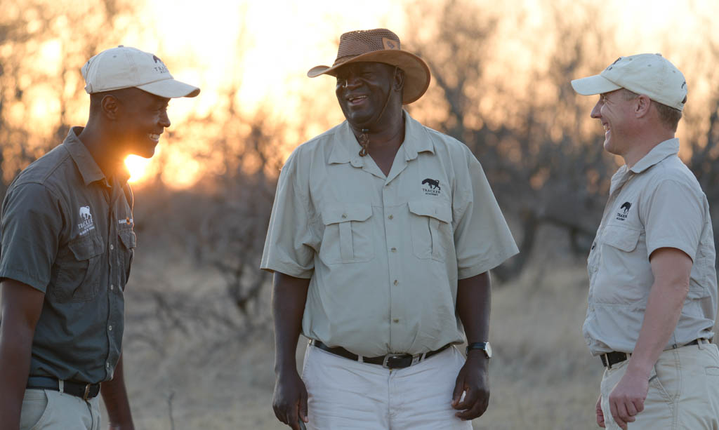 Trackers in the bush at golden hour